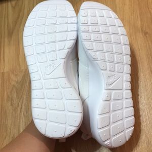 All white Nike Roshe One